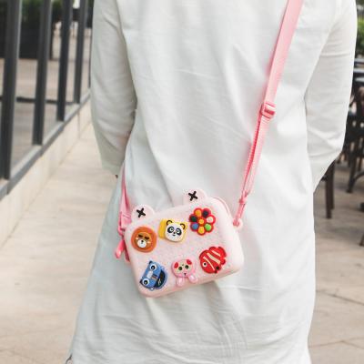 China Custom Made High Quality Anti-theft Women's Classic Cute Cartoon Logo Body Shoulder Bag Fashion Coin Purse Silicone Cross Shoulder Bag for sale