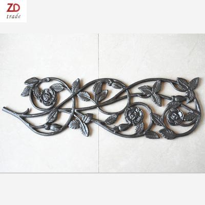 China New Type Easily Assembled Wrought Iron Door Ornament Cast Stamping Flower And Leaf Cast Iron Panels Wrought Iron Window Fence for sale