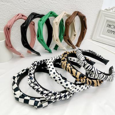 China Wholesale Fashion New Fashion Hair Hoop Printed Accessories Faux Leather Hair Women Hair Band Knot Leather Headband for sale