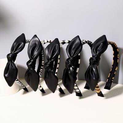 China Fashion Korean Fashion New Hair Hoop Printed Accessories Faux Leather Hair Women Hairband Bow Leather Headband for sale