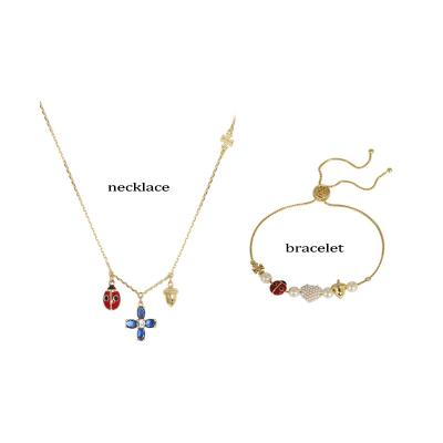 China Vintage TB Fashion Ladybug Tassel Flower Heart Necklace/Bracelet Set Flower Sweet Lady's Crystal Gold Plated Jewelry Set for sale