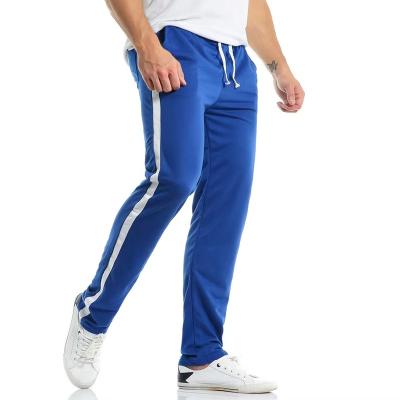 China 2021 New Men's Casual Flat Autumn Blocking Stripe Tight Sports Straight Pants for sale