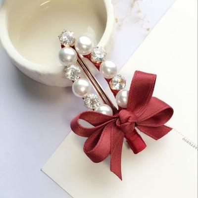 China 2021 Hot Fashionable Wholesale Hairpin Duck Hairpin Beautiful Hair Clip Zircon Bowknot Hairpin Pearl Hair Clip Fashionable Beak Clip For Girls for sale