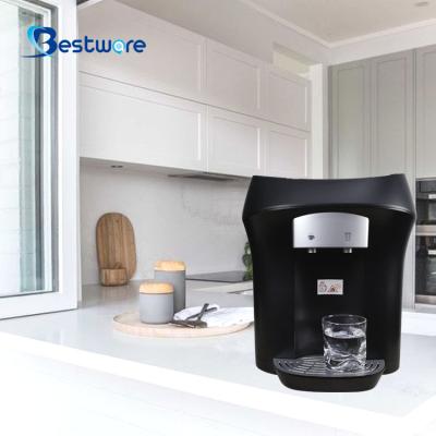 China Best Hot Selling Hot Hot Cold Hotel RO Filter Table Top Countertop Water Vending Machine For Household for sale