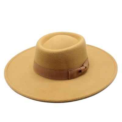 China Fashion Casual Wool Large Brim Jazz Hat For Women Concave Top Fedora Hats for sale