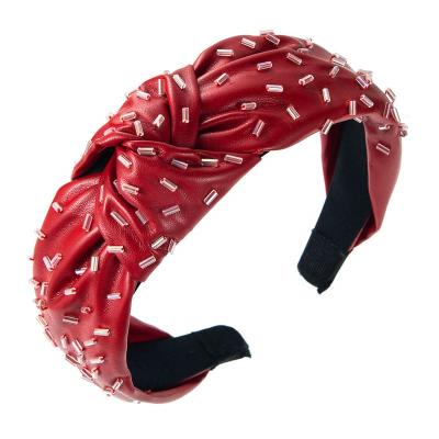 China Shenglan Fashion Friendly Material Vintage Hand-stitched Red Twisted PU Leather Headband Knot Headband Women for sale