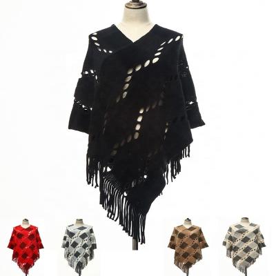 China Acrylic Knitted Tassel Poncho Fashion Women Winter Shawl Cavity Capes and Acrylic Ponchos for sale