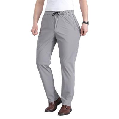 China Anti-wrinkle Men Fast Dry Stretch Pants Ice Silk Trousers Solid Color Mid-waist Loose Breathable Straight-leg Casual Pants Thin Sports Pants for sale