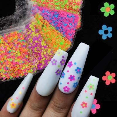 China Eco-friendly Material Summer Mixed Colors 4MM Glitter Neon Fluorescence Nail Glitter Flower Glitter Flakes For Nail Art Decorations Charm for sale