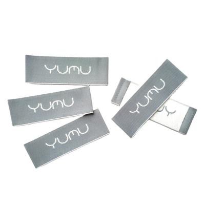 China Sustainable Quality Cheap Eco-friendly OEM Customized Sewing Woven Label Stick On Back Woven Label For Clothing for sale