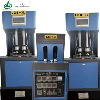 China LG2B-3L Bottle 2 Cavity Blow Molding Machine Semi Automatic Blow Molding Machine 1 L 2 L for sale