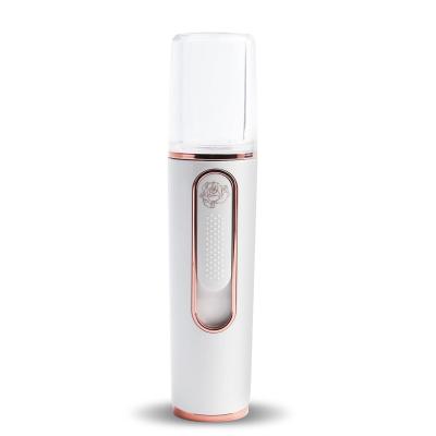 China Portable Mini Beauty Instrument Nano Handy Mist Spray Atomization Inhaler Facial Steamer Refillable Face Steamer Moisturizer for sale