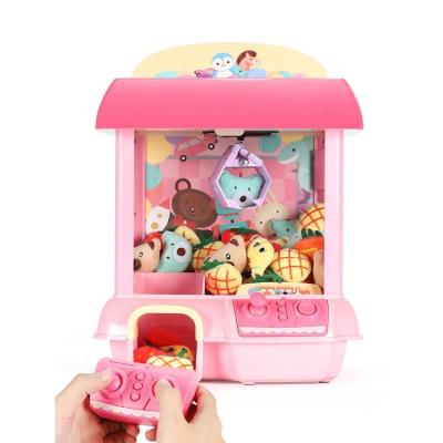 China Cute Cartoon Children Play Mini Claw Machine Funny Toy Doll Mini Game Doll Slot Catching Machine for sale