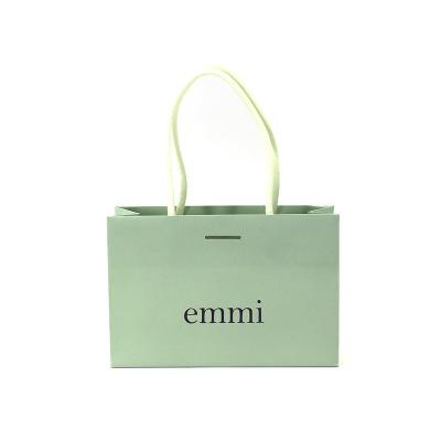 China Recyclable customized Luxury Black White Paper Bag Gift Custom Printed Shopping Bag for sale