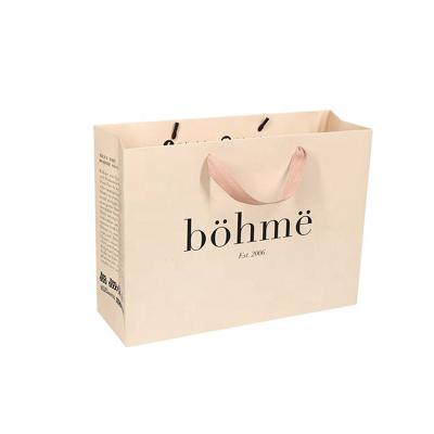 China Recyclable Customized luxury  Brand printed Logo Luxury Boutique Shopping Paper Gift Bags for hair shop for sale