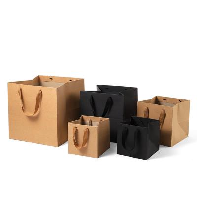 China Recyclable Custom Printed Your Own Logo Packaging White Brown Kraft Gift Craft Shopping Paper Bag With Ribbon Handles for sale