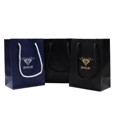 China Recyclable custom luxury beauty gift bag packaging custom black paper thank you gift bags with logo print for sale