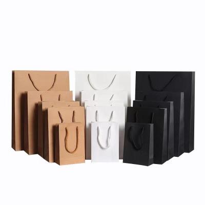 China Recyclable Hot Stamping Shopping Boutique Paperbag Mini Clothes Christmas Party Pink  Luxury Gift Custom Paper Bag With Ribbon Handle for sale