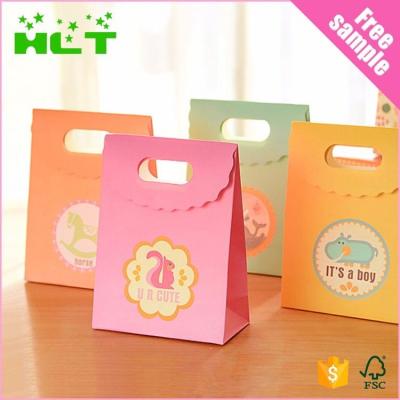 China Recyclable Cheap Color Printing Handmade Kraft Paper Die Cut Paper Bag With Logo Print for sale