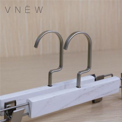 China Kids Eco-friendly Material Wooden Clothing Hanger White Clothes Clip Hangers Pants for sale