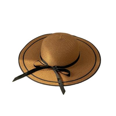 China Breathable Big Gutters Ribbon Black Straw Hat Ladies Summer Border Foldable Sun Hat for sale