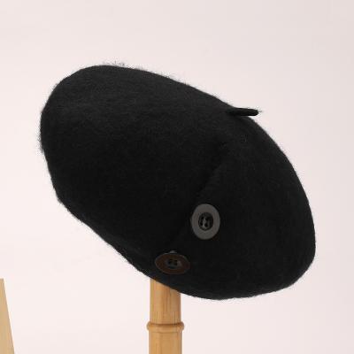 China Girls Comfortable Felt Hat Autumn And Winter Button Portable Black And White Berets for sale