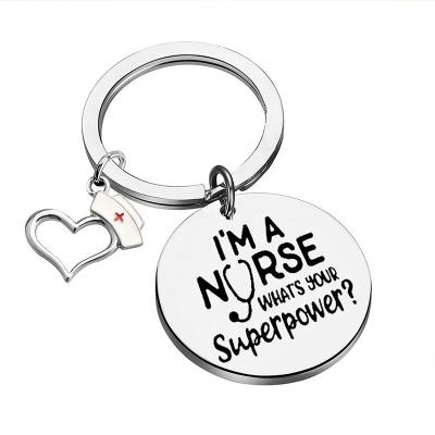 China Trendy Nurse Gift Letter Pendants I Am A Nurse With Hat Stainless Steel Designer Key Chain For Women for sale