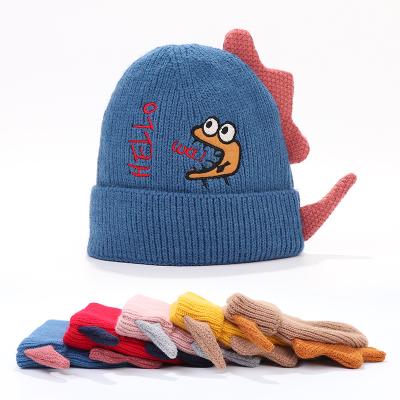 China Autumn Winter Fashion Trend Outdoor Character Kids Cartoon Dinosaur Warm Cute Embroidery Knitted Hat for sale