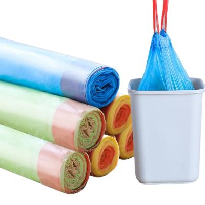 China Disposable blue plastic drawstring garbage bags on roll for sale