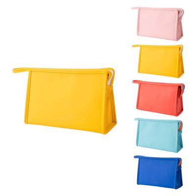 China New Fashion PU Candy Color Cosmetic Bag Storage Triangle Cosmetic Bag Cosmetic Bag for sale