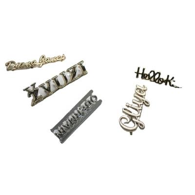 China Fashionable Customized Handmade Metal Letters Label ,Sewing Decorative Metal Label Name Tags For Handbag for sale