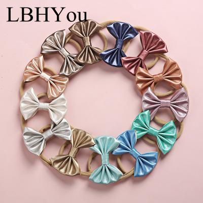 China 2021 Lowest Price New PU Girls Hand Tie Toddler Headbands Infants Headbands Factory Sale Elastic Leather Nylon Elastic Nylon for sale