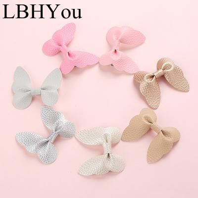 China PU Bows Elastic Soft Leather Headbands For Babies, School Girls Butterfly Knotbow Hair Clips Fit One Size for sale