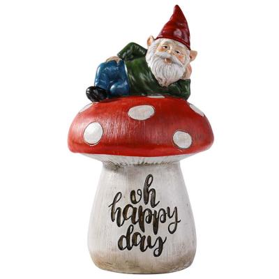 China Cute Resin Gnome Statue Sitting on Mushroom Gnome Figurine Character Garden Decor Outdoor Pastoral Crafts and Ornaments for sale