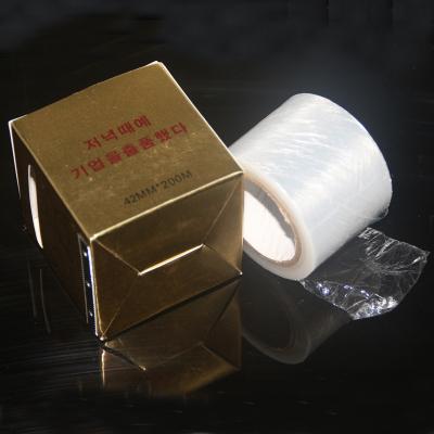 China Disposable Plastic Eyebrow And Lip Tattoo Eyebrow Tattoo Tools Covering Cool Film Wrap Cover Tape Microblading Roll for sale