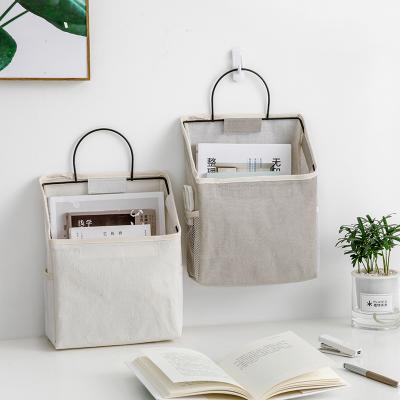 China Viable Hanging Wall Mounted Table Cloth Cotton Bedroom Dormitory Storage Bag Wall Cloth and Storage Canvas Bag for sale