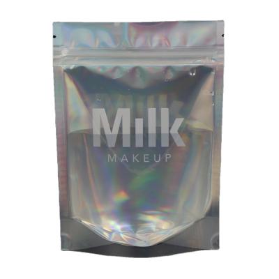 China Safety Laser Effect Clear Milk Make Up Plastic Food Packaging Bag Holder Up Pouch for sale