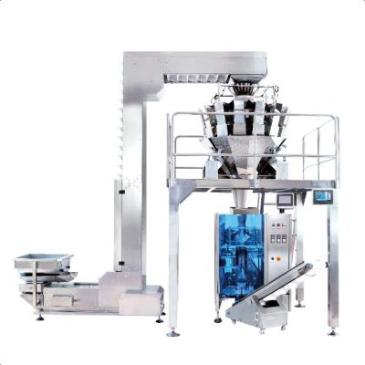 Cina Automatic high productivity multihead weigher weighing and packing machine for candy peanut snack in vendita