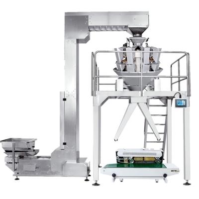 Cina Two Outlet Semi Auto Sugar Weighing and Packaging Machine Candy Packing Machine Packaging Line in vendita