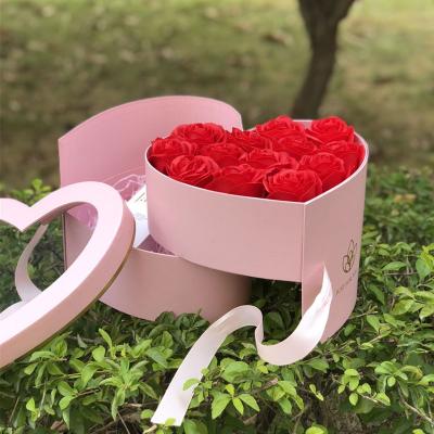 China Recycled Materials Double Layer Flower Gift Heart Shape High End Revolving Box With Clear Lid for sale