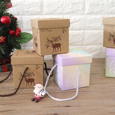 China Recycled Materials Cube Christmas Cookie Packaging Custom Folding Gift Box With Handles for sale