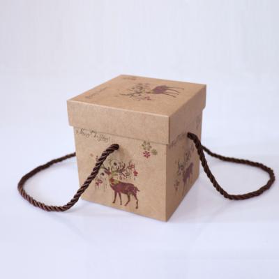 China Recycled Materials Cube Luxury Christmas Paper Gift Packaging Boxes With Handles for sale