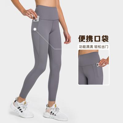 China 2022 New Pocket Patchwork Breathable Bare Waist Feeling Yoga Sports Running Leggings for sale