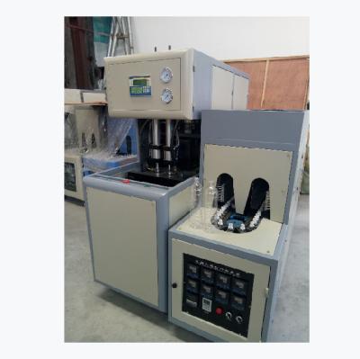 China One Out Two Semi-Automatic Bottle Blow Molding Machine Te koop