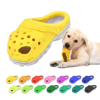 China Viable Hot Selling Soft Rubber Chew Toy Teeth Clean Dog Bites Toy Industructable Dog Slipper Toys for sale