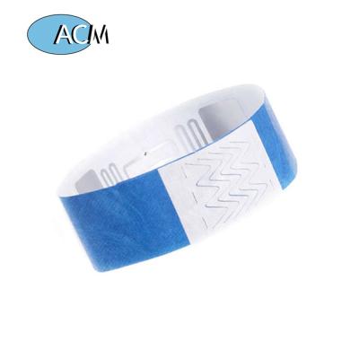 China Custom Waterproof / Waterproof Printable Disposable Wristband RFID Paper Wristband 13.56Mhz One Time Wear Waterproof Wristbands for sale