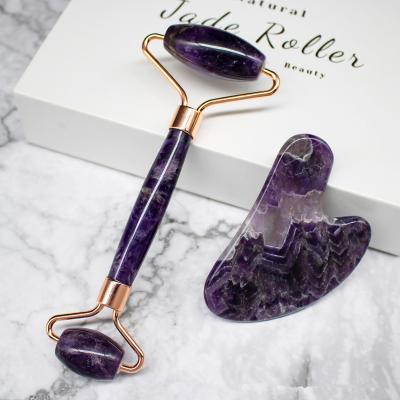 China Crystal Gemstone Face Lift Gua Sha Purple Massage Jade Amethyst Facial Roller for sale