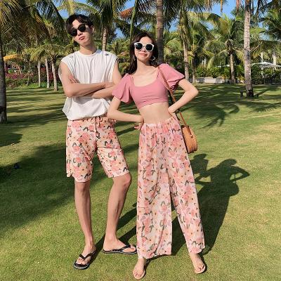 China New Couples Beach Wear Vacation Fashion Swimwear Anti-UV Trunks (one set including women skirt and men boxer) for sale