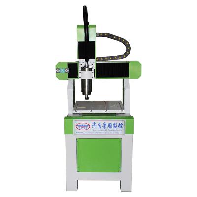 China Mini Metal CNC Woodworking CNC Router Aluminum 6090 Sign CNC Router Acrylic Milling Machine/Advertising Cutting Machine 6040 Mach3 USB Router MDF Logo for sale