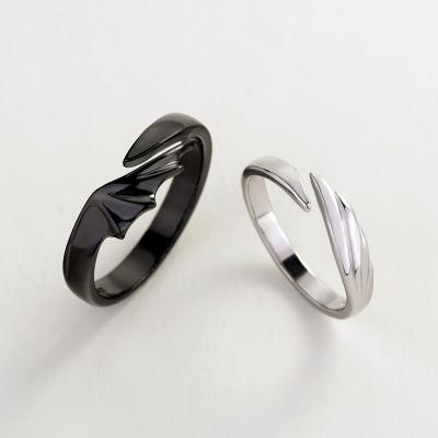 China 2022 New Hiphop Style Unisex Devil Angel Silver Black Copper Rings For Couples for sale